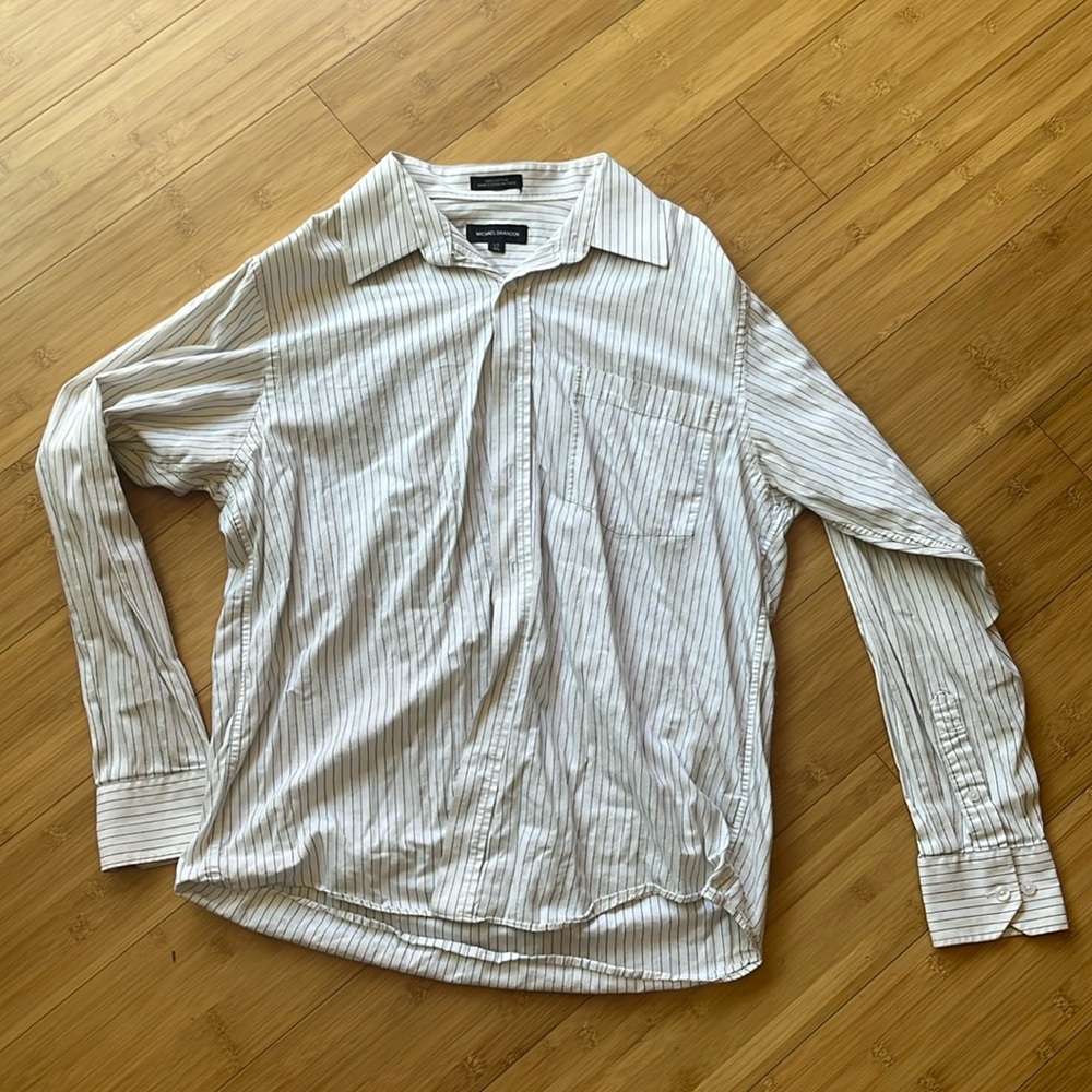 Collared white shirt with thin black stripes